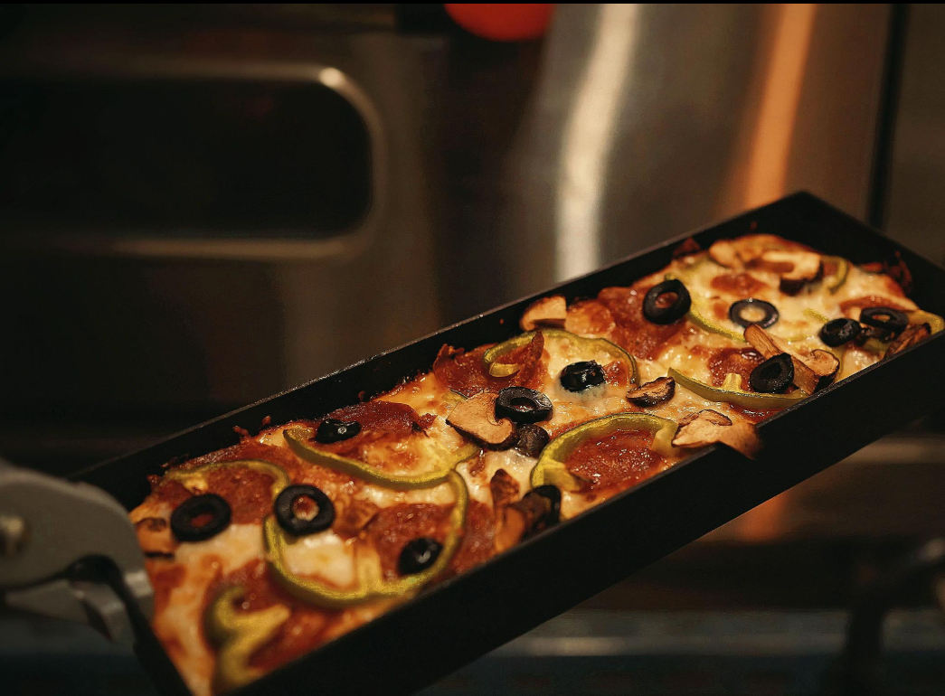 Detroit-style pan pizza with caramelized cheese edge, Chiang Mai